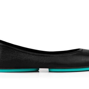 Black Tieks foldable flats